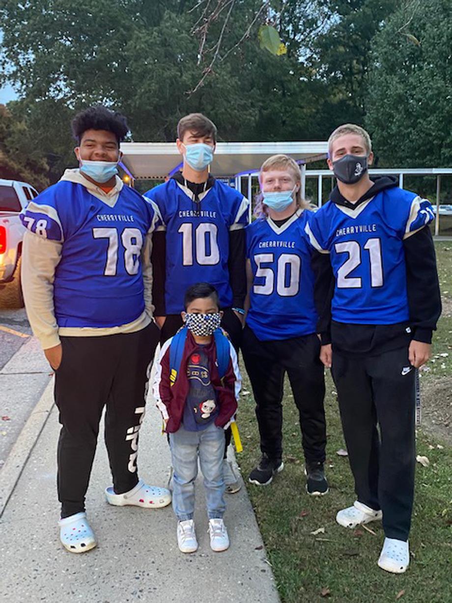 Football players from Cherryville High School visited Cherryville Elementary and W.B. Beam Intermediate School and welcomed the students as they arrived at school. 